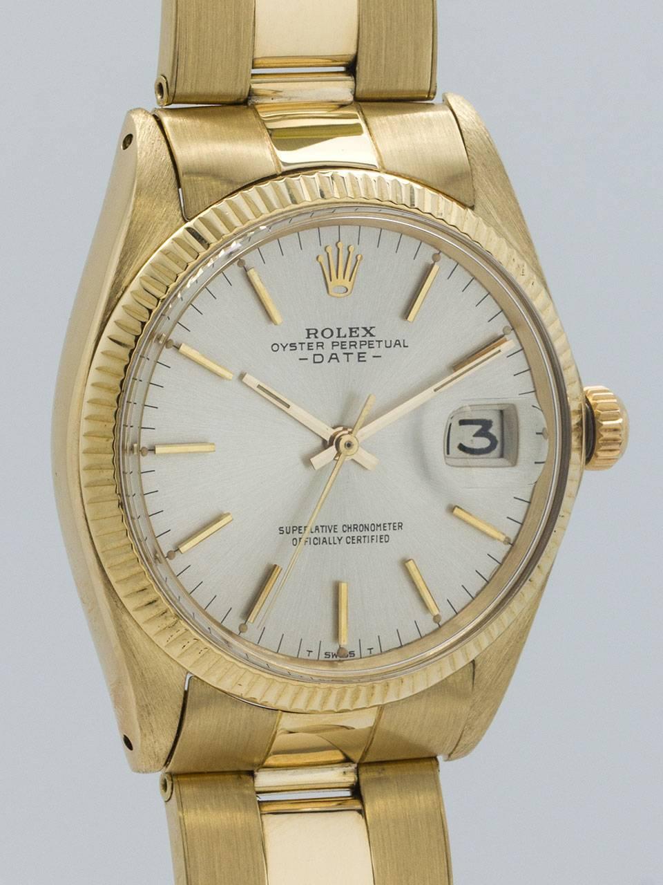 Rolex 14K Yellow Gold Oyster Perpetual Date ref 1500 serial no 1.3 million circa 1966. 34mm diameter case with fluted bezel and acrylic crystal. Original silver satin dial with applied gold indexes and gold baton hands. Powered by self winding
