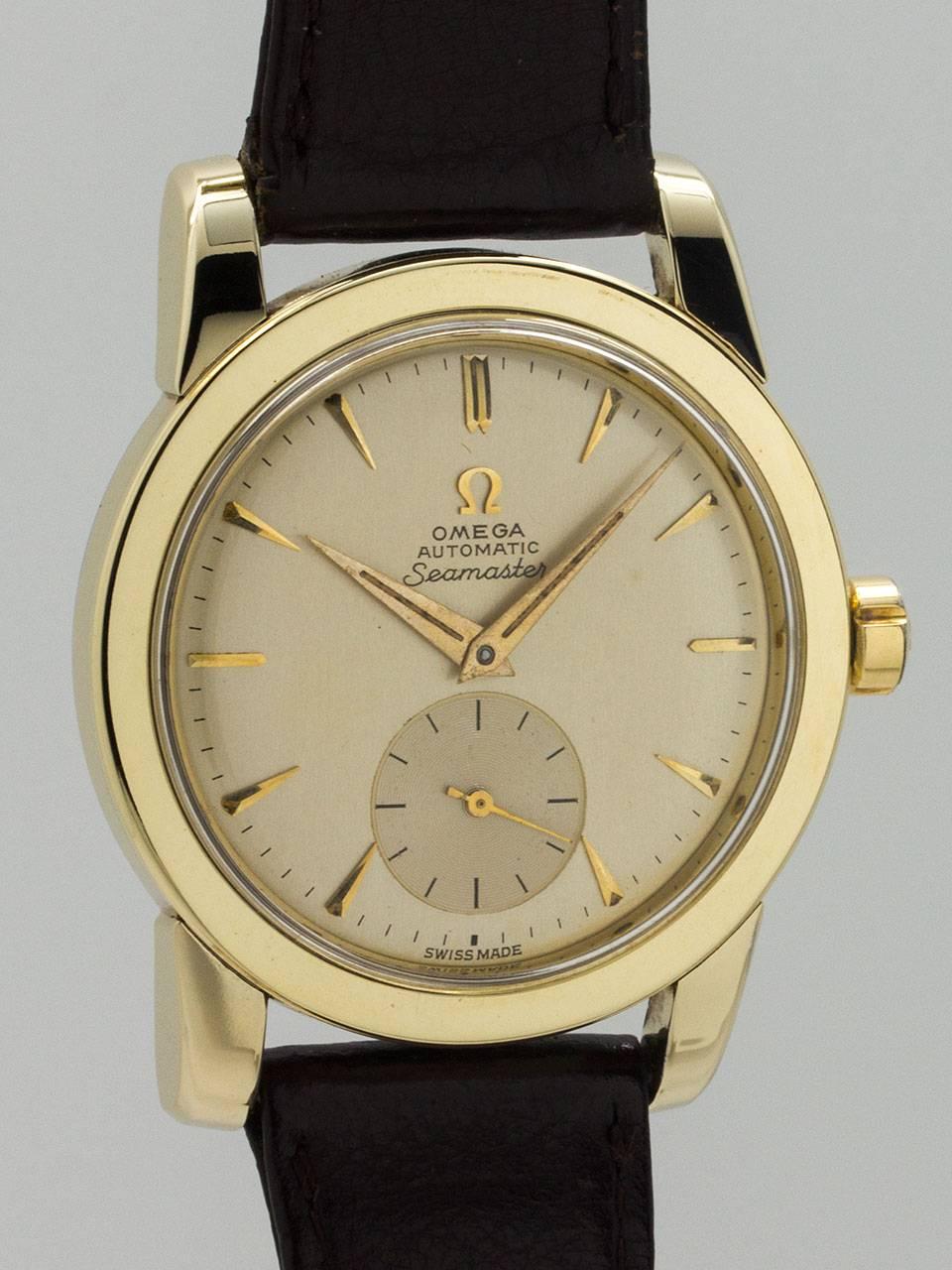 Omega Seamaster ref 2766-1 movement serial number 14.3 million circa 1954. Great looking large and robust 35 x 42 mm case with wide bezel and wide heavy lugs, signed Omega crown and snap back steel case back. Gold shell case in excellent condition