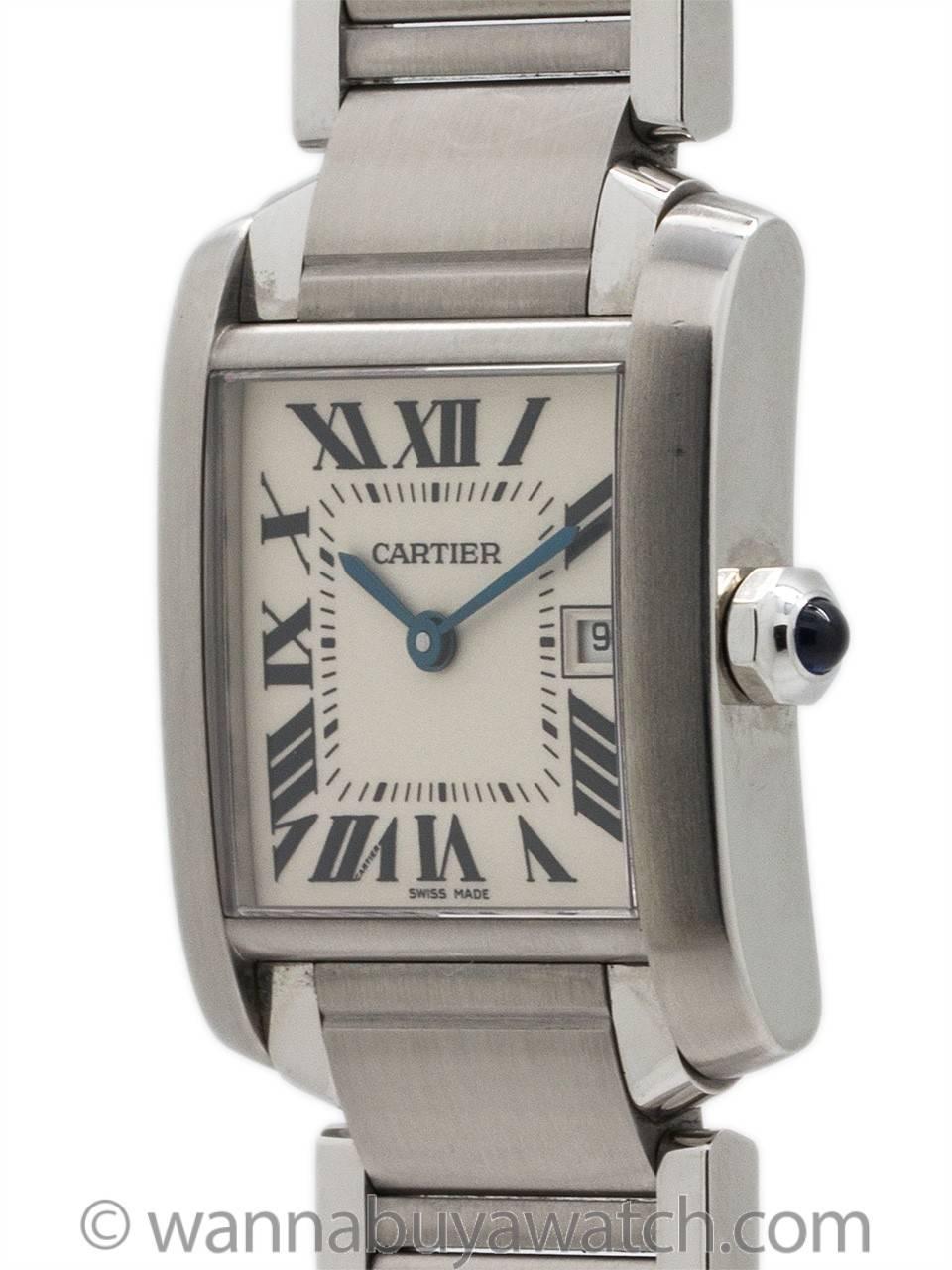 Cartier Tank Francaise stainless steel midsize model with date. Featuring 26 X 35 mm case with sapphire crystal. Classic silvered dial with Roman numerals and blued steel hands and sapphire cabachon crown. Battery powered quartz movement. With