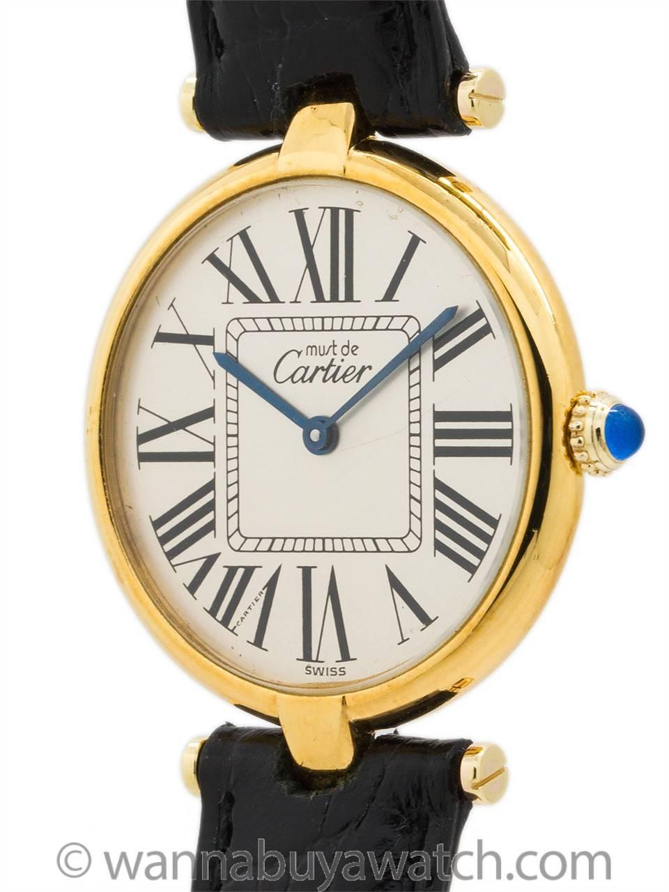 Cartier Man’s Vermeil Vendome Tank Wristwatch circa 1990s. Case measuring 30.5 x 37mm with T-bar lugs. Featuring a distinctive original matte silvered dial with oversize printed Roman numbers with inner square minute track and blued steel hands and