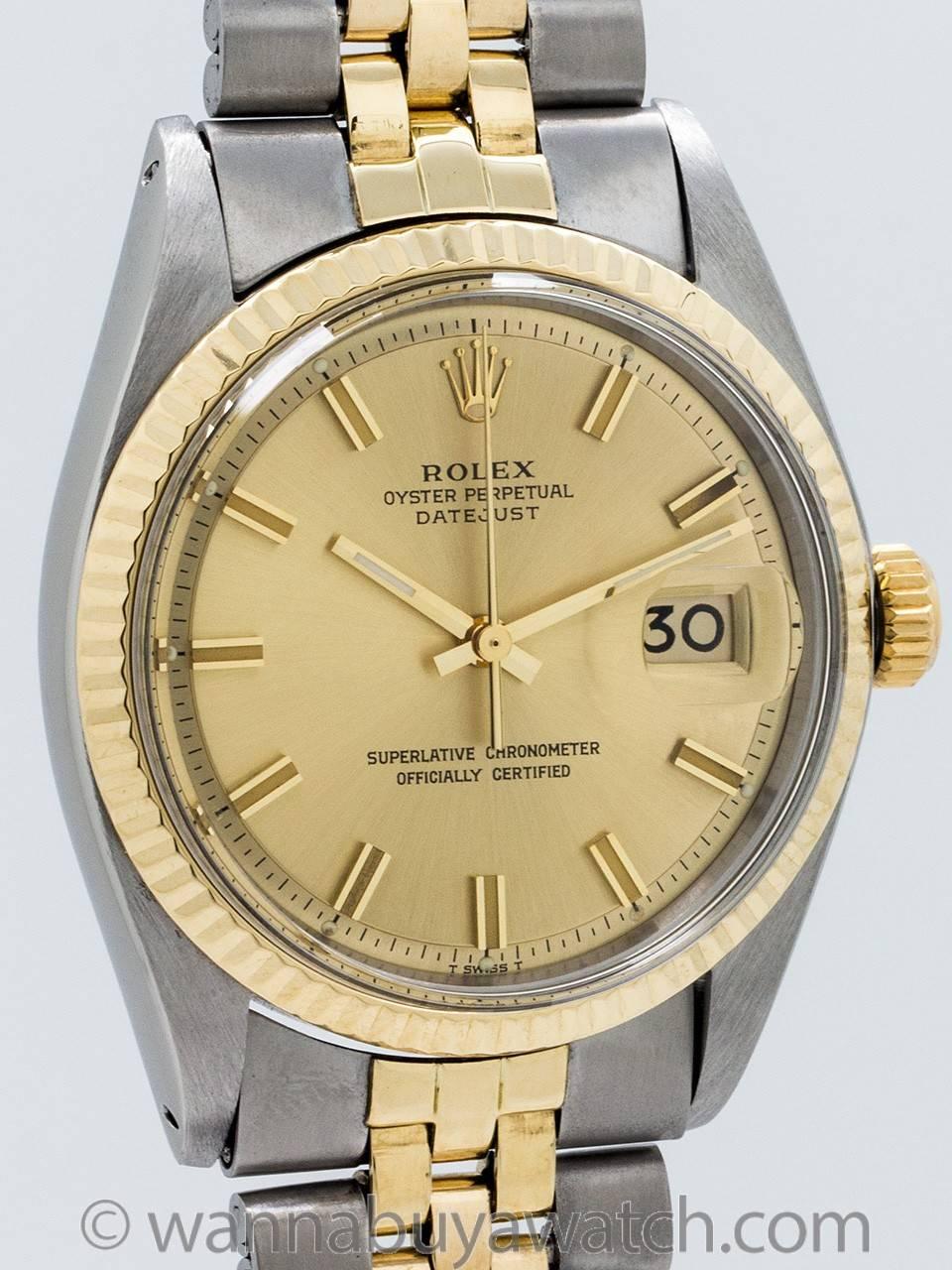 Rolex Datejust ref 1603 stainless steel and 14K yellow gold circa 1970’s. Featuring a 36mm diameter case with 14K YG fluted bezel, acrylic crystal, and original champagne, pie pan dial with applied gold indexes and gold baton hands. Powered by self
