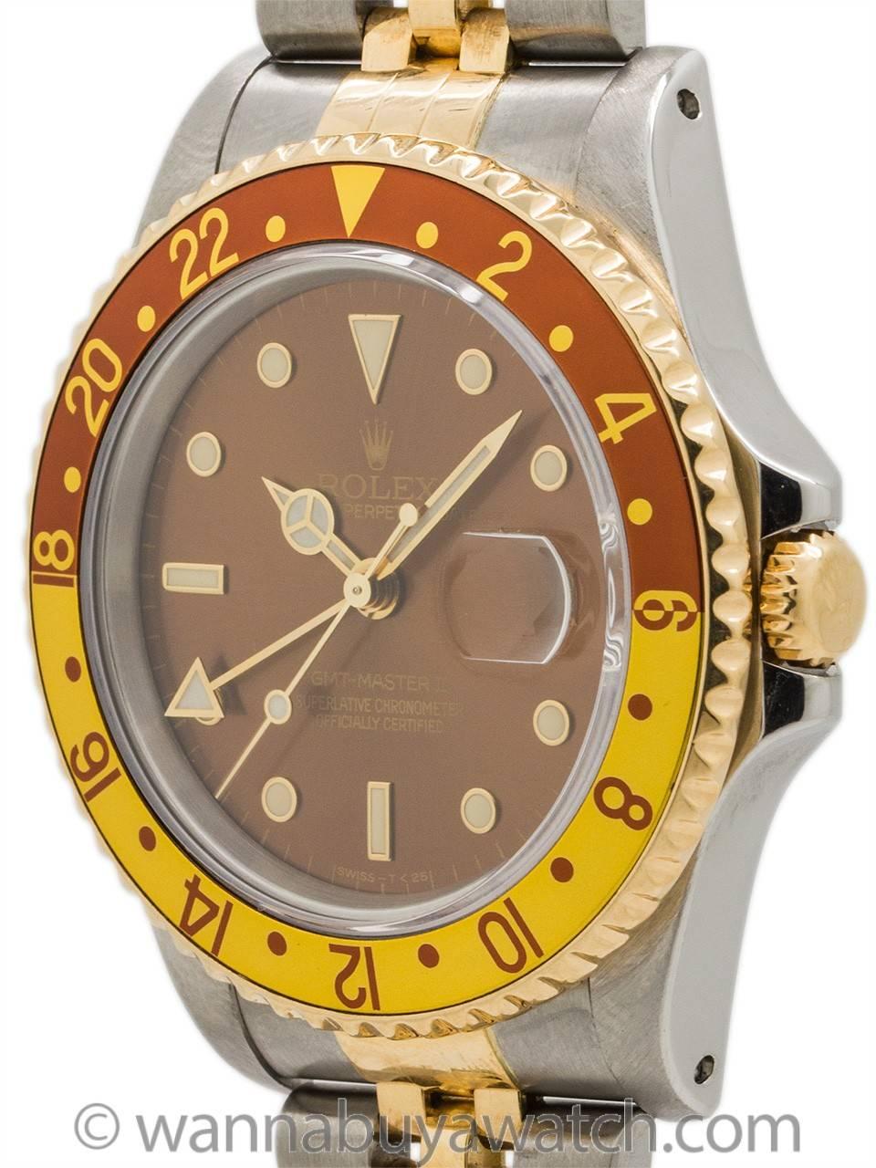 An exceptional condition Rolex GMT SS/18K YG ref 16713 serial # N3 circa 1991. Featuring 40mm diameter stainless steel case with 18K YG bi-directional 24 hour GMT bezel, acrylic crystal, and very pleasing “root beer” dial with gold surround luminous