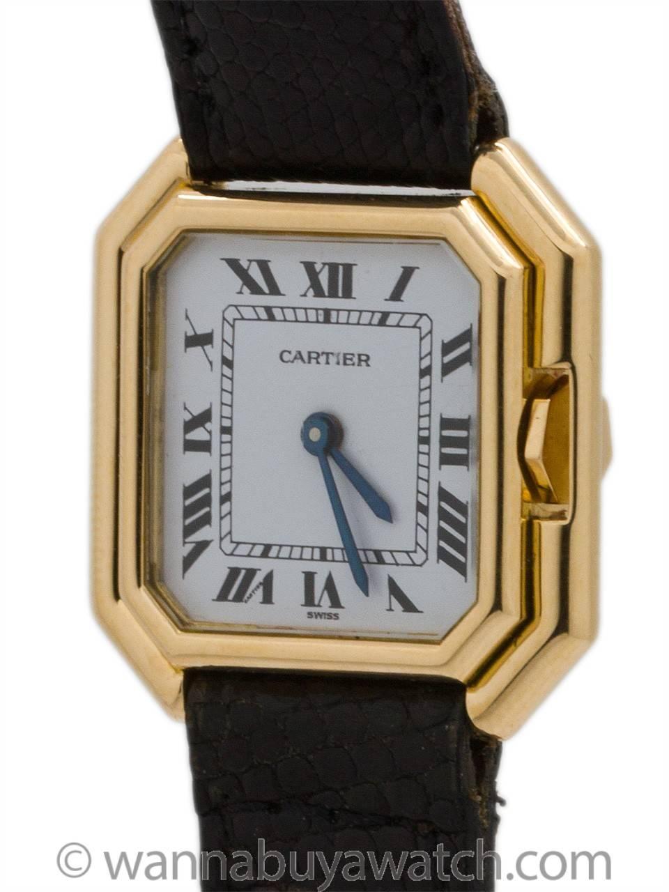 Vintage Lady Cartier 18K YG “Ceinture” model circa 1970’s. Featuring 25 x 25mm square case with wide stepped bezel, cut corners, and protected crown. Mineral glass crystal, glossy white original dial with classic black Roman figures and blued steel