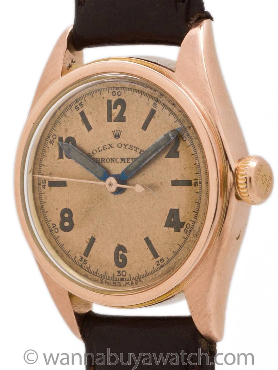 Vintage Rolex 14K Rose Gold manual wind boy’s size (31mm) Oyster case with screw down case back and rose gold screw down bubble back era crown circa 1940’s. With very pleasing original patina dial with original radium luminous figures and original