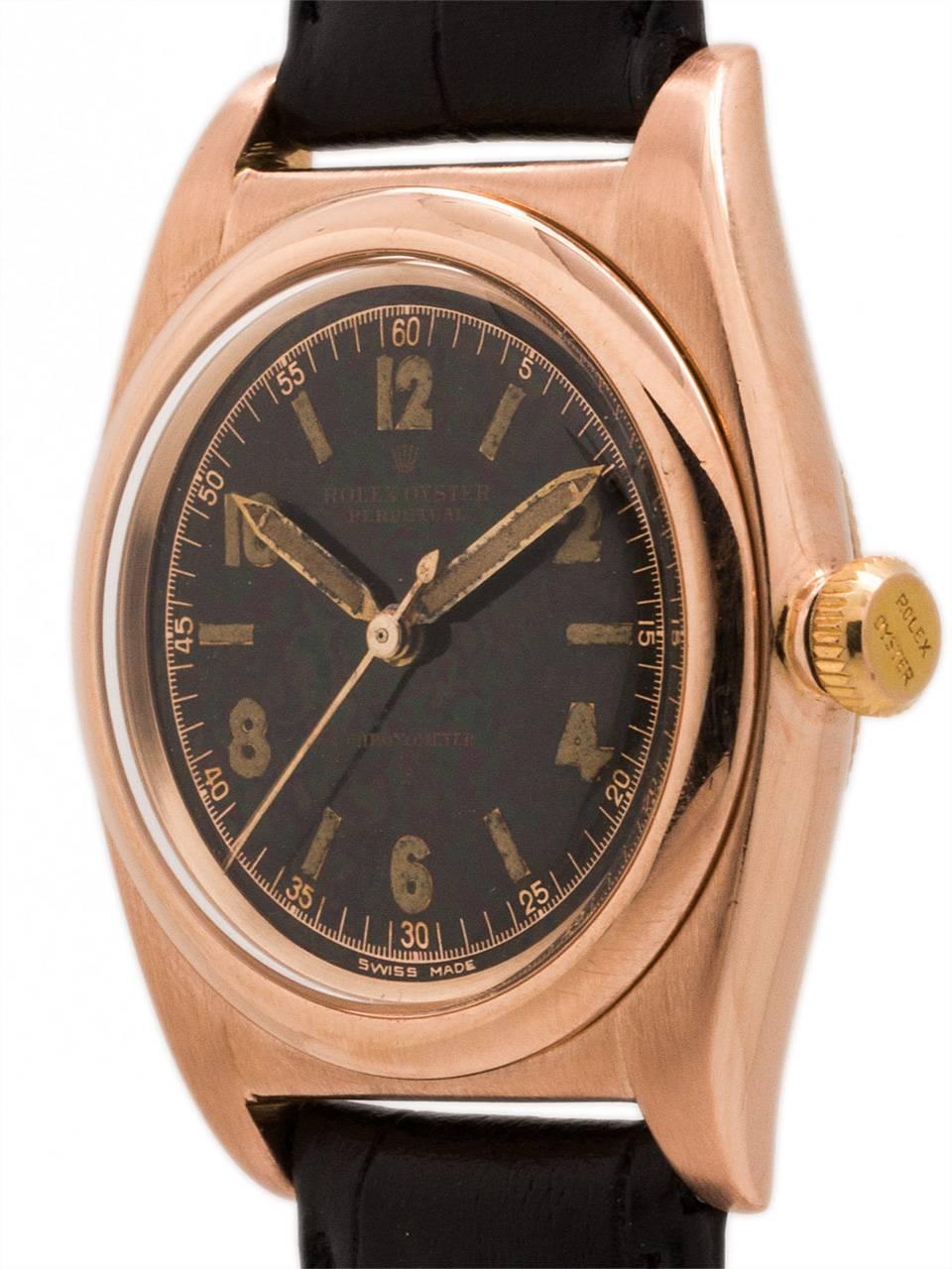 Great looking man’s Rolex Bubbleback 14K Rose Gold ref 3131 case serial # 444,xxx circa 1946 with very desirable original black luminous dial. Featuring 32mm diameter Oyster case with screw down caseback, screw down crown, smooth bezel, acrylic