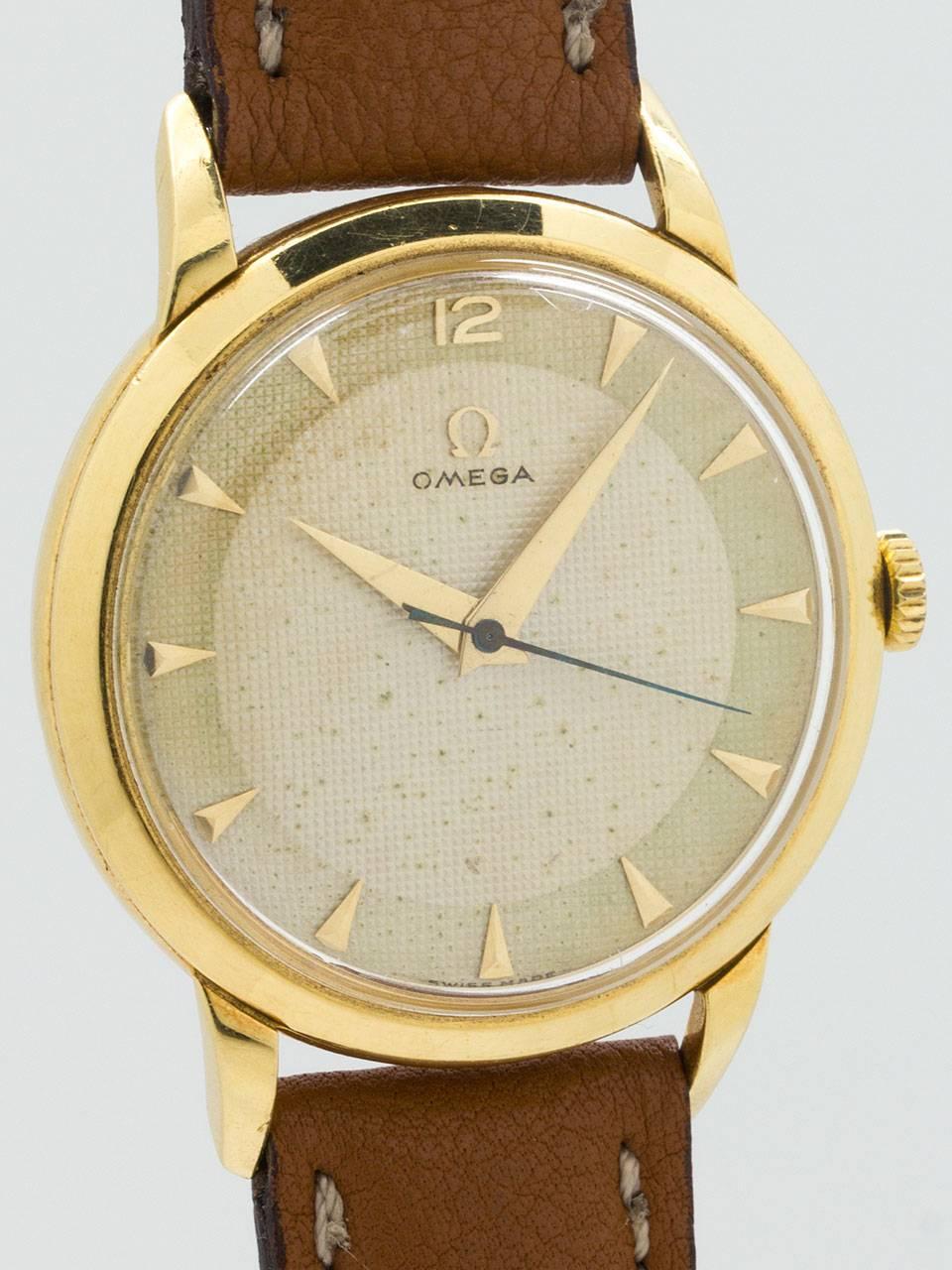 Retro Omega  Yellow Gold Dress Model Textured Dial Manual Wristwatch circa 1950s For Sale