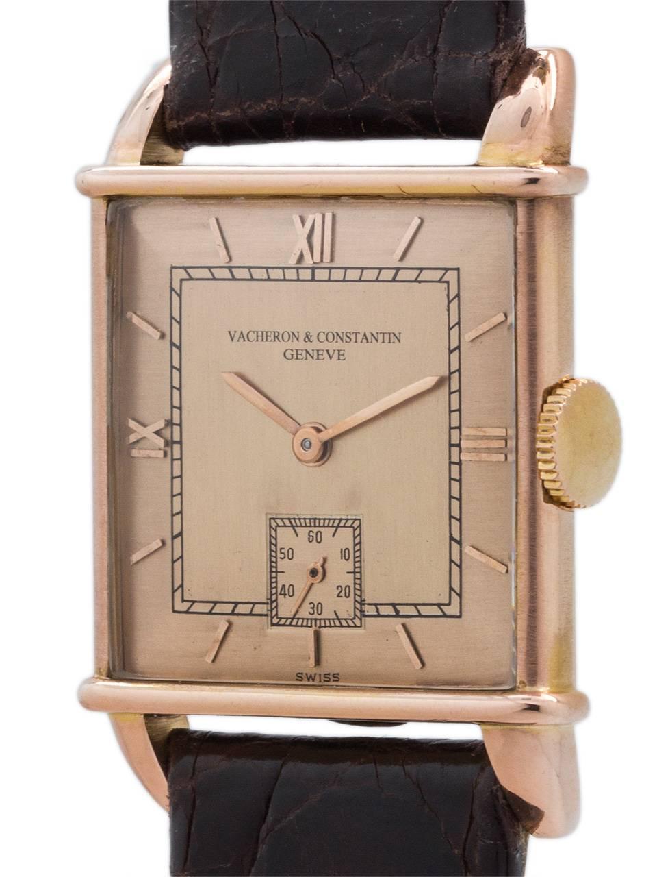 Vacheron and Constantin 18K Pink gold square case dress model circa 1940’s. Featuring a very stylish 26 x 36mm case with raised horizontal band at top and bottom of case, and with prominent extended curved claw lugs.  Featuring a beautifully