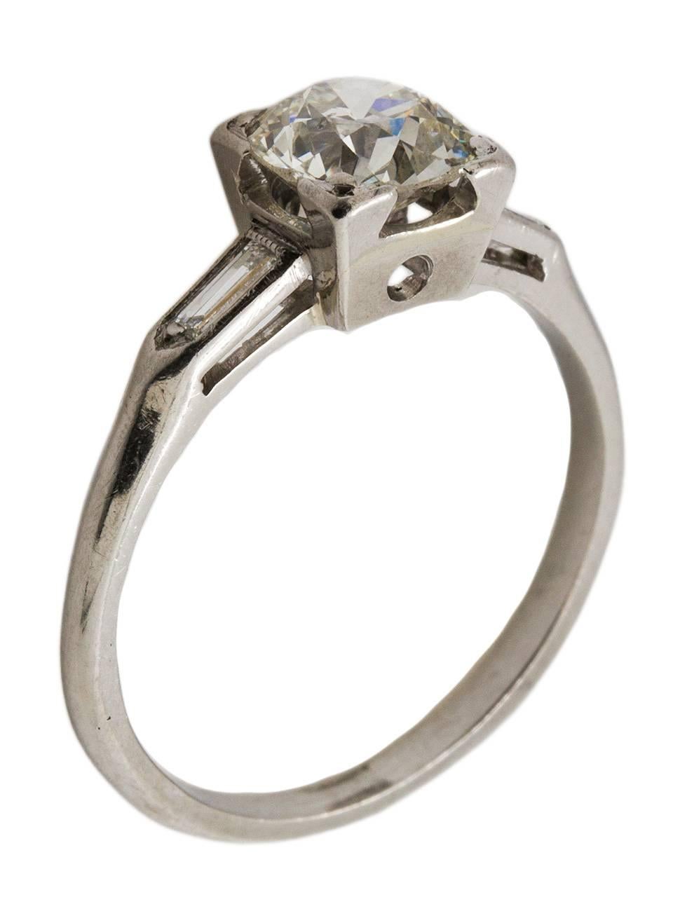 Absolutely gorgeous antique platinum engagement ring with a very lively .85ct Old European Cut center diamond, G color (near colorless)/SI1 clarity. This lovely mounting has an elevated center setting, with open side galleries, a tapered shank and