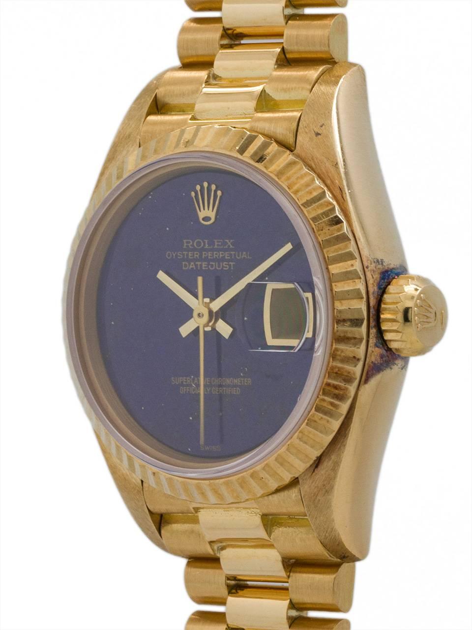 Exceptionally mint condition and stunning Rolex Lady President ref 69178 serial #8.4 million circa 1985. 27 x 33mm 18K yellow gold case with fluted bezel and sapphire crystal. Brilliant blue factory lapis lazuli stone dial with applied rolex logo
