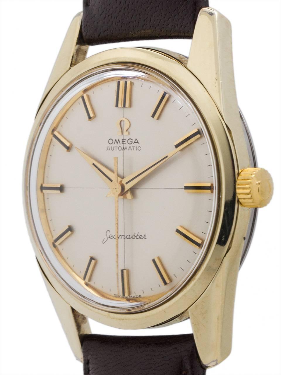 Great looking Omega Seamaster automatic circa 1961 featuring a 34 X 42mm gold shell case with wide bezel and heavy lugs, and screw down stainless steel case back with deeply embossed Omega seamonster logo.  Featuring an especially well preserved