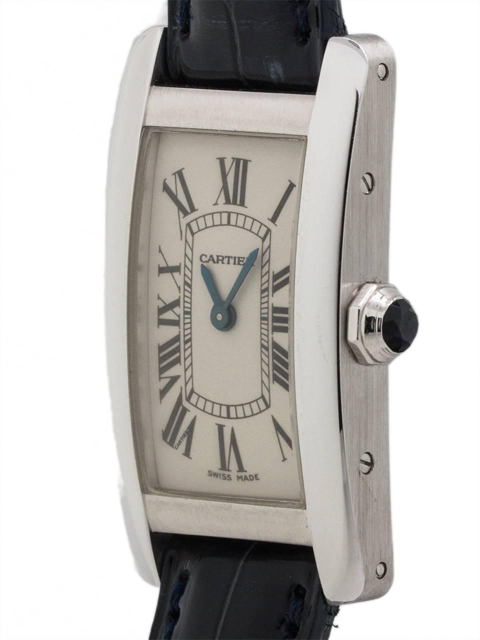 Pristine condition Cartier 18K white gold Tank American ref 2482 circa 2000. Featuring classic curvex style 20 X 35mm case secured by 8 side screws and 4 caseback screws. With classic original  silvered dial with Roman figures including Cartier