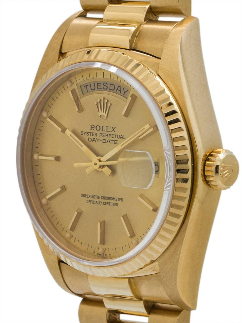 Rolex ref 18038 18K YG Day Date President case serial# 7.2 million circa 1982. Featuring 36mm diameter full size man’s model with sapphire crystal and fluted bezel, with a beautiful original champagne Rolex dial with gold applied indexes and gilt