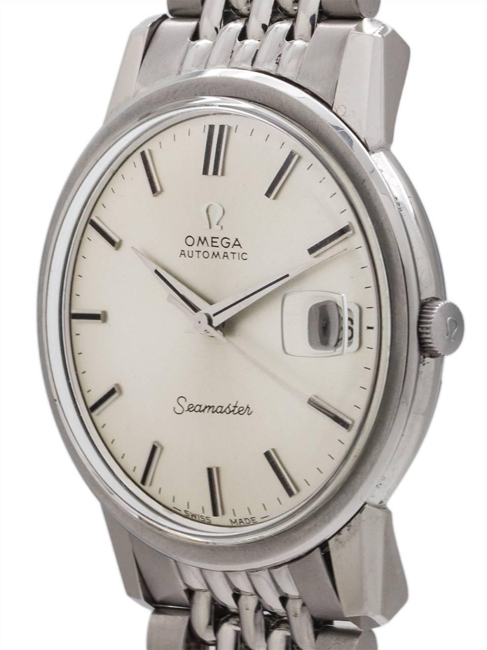Vintage Omega Seamaster automatic circa 1967. Featuring 35 X 42mm case with screw down case back with deeply embossed seamonster logo, acrylic crystal, and with super minty condition original silvered satin dial with applied silver indexes and