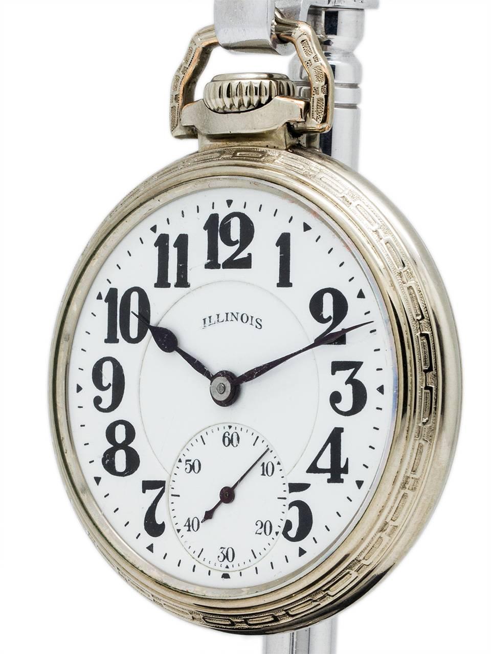 Beautiful example Illinois 16-S Bunn Special 60 hour base metal pocket watch, circa 1929. Gorgeous double sunk white enamel dial with bold Arabic numeral markers, subsidiary seconds at 6 o'clock and blued steel spade hands. Excellent condition,