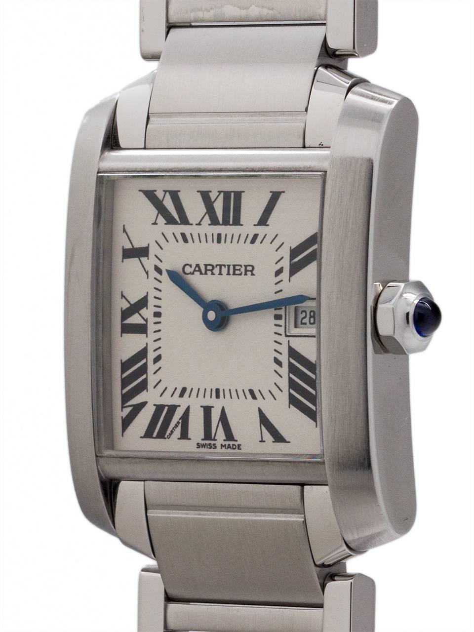 Cartier Tank Francaise stainless steel midsize model with date. Featuring 26 X 35 mm case with sapphire crystal. Classic silvered dial with Roman numerals and blued steel hands and sapphire cabachon crown. Battery powered quartz movement. With