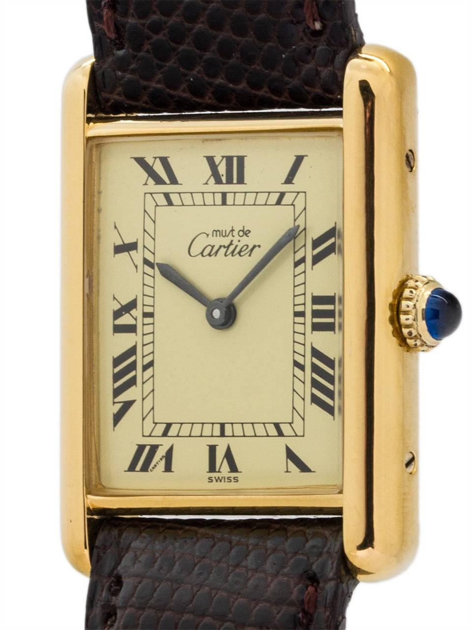 Cartier Man’s Tank Louis circa 1990s. Featuring 24 x 30mm vermeil (20 microns gold over silver) case secured by 4 side and 4 case back screws. Featuring classic cream color dial signed Must de Cartier with printed black Roman numerals and blued
