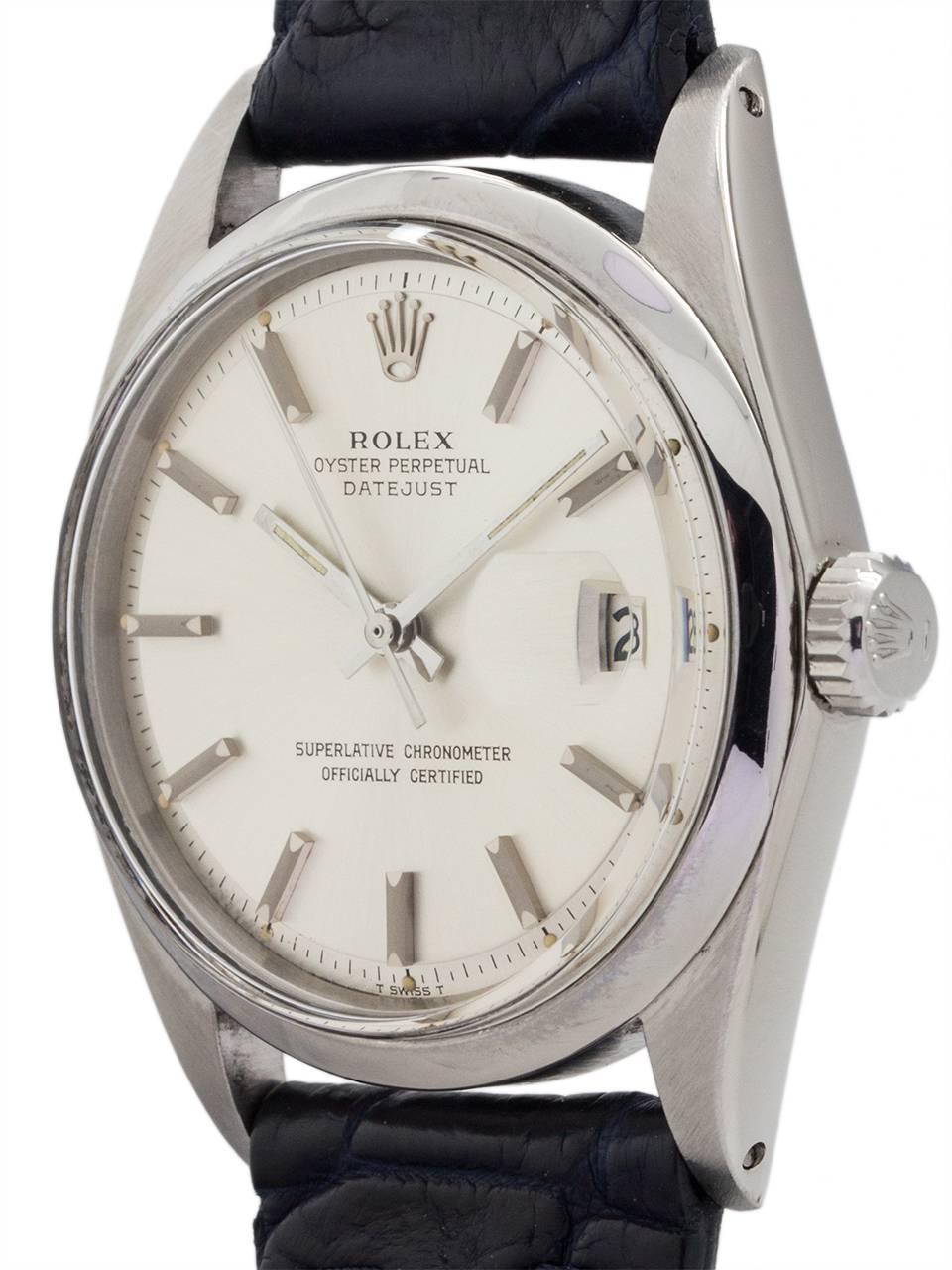 Rolex Man’s Stainless Steel Datejust ref 1603 serial # 2.4 million circa 1970. Featuring 36mm diameter case with smooth bezel, acrylic crystal, and original silver satin pie pan dial with applied silver indexes and silver baton hands. Powered by