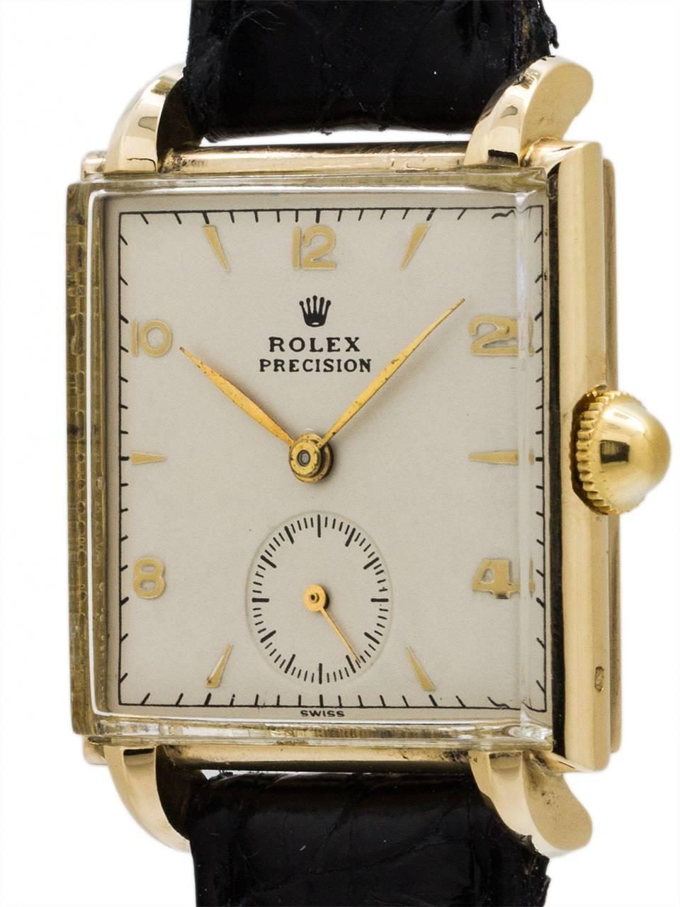 Scarce design vintage Rolex dress model ref 4330 14K yellow gold circa 1940’s. Very pleasing design square case with rounded and sculpted sides, pronounced and well proportioned lugs, contoured mineral glass crystal, original period Rolex mushroom