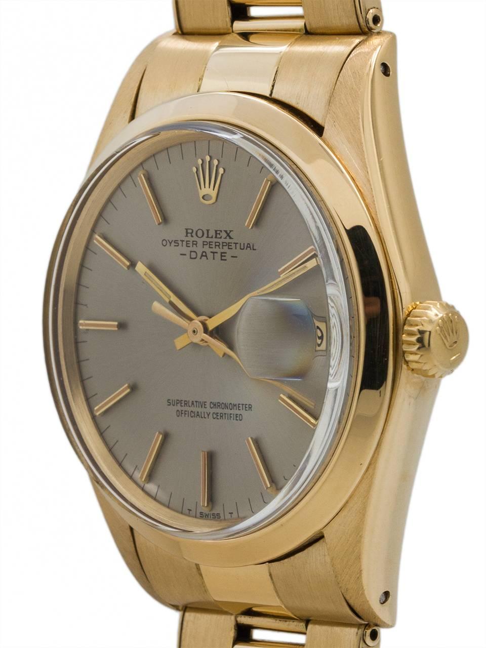 Rolex 18K YG Man’s Oyster Perpetual Date ref 1500 serial#1.7 million circa 1968.  Featuring a 34mm diameter  case with 14K YG smooth bezel with acrylic crystal and beautiful original silver satin dial with applied gold indexes and gilt hands.