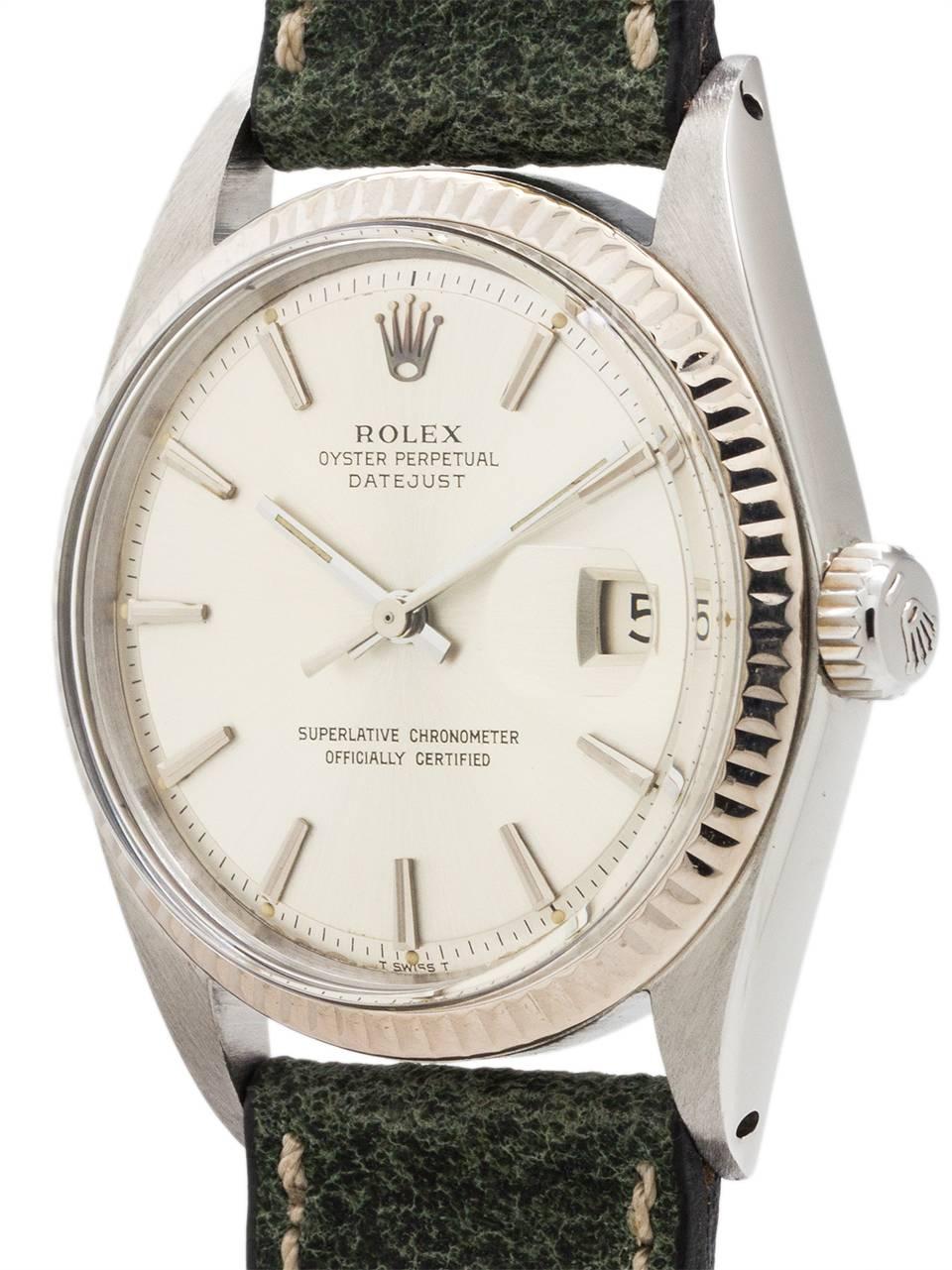 Rolex stainless steel Datejust ref 1601 serial number 2.3 million circa 1970. Featuring 36mm diameter Oyster case with 14K WG fluted bezel, acrylic crystal and signed crown. Lovely original silver satin dial with applied indexes and baton hands.