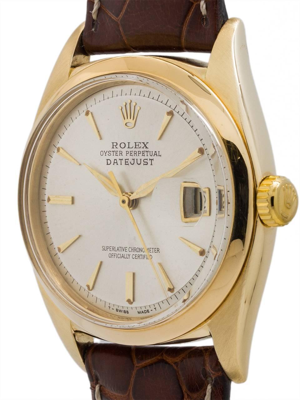 Rolex 14K yellow gold Datejust ref 1601 serial number 779,xxx circa 1962. Featuring 36mm diameter Oyster case with smooth bezel, acrylic crystal and beautiful condition original silvered satin dial with applied gold tapered indexes, Rolex crown logo