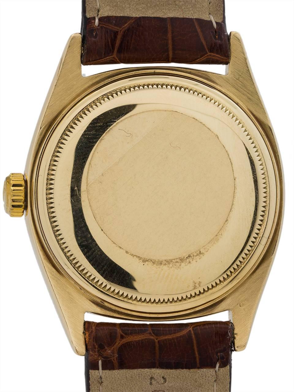 Men's Rolex Yellow Gold Datejust Self Winding Wristwatch Ref 1601, circa 1962