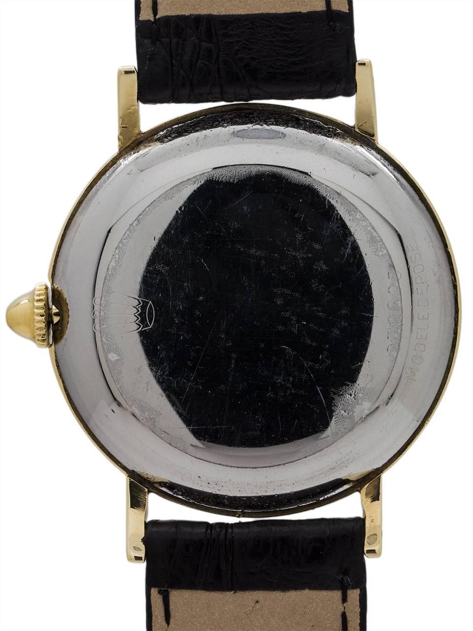 Men's Rolex Yellow Gold Top Dress Model Manual Wind Wristwatch Ref 4325, circa 1950
