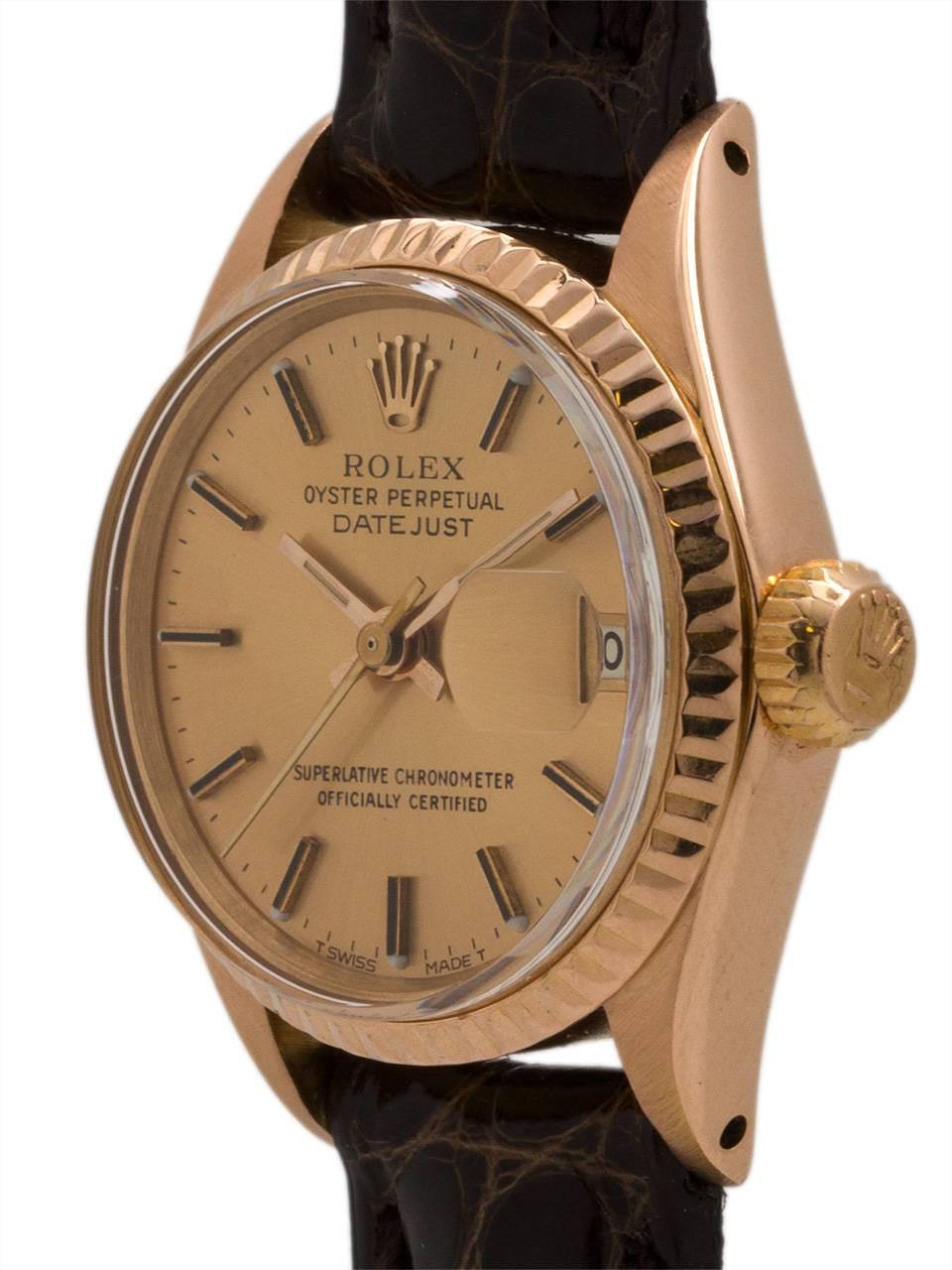 Vintage lady’s Rolex 18K rose gold Datejust ref# 6517 serial # L3 million circa 1987. Featuring a 27mm diameter Oyster case with screw down case back and screw down crown. With fluted bezel, acrylic dome crystal, and beautifully restored rose dial