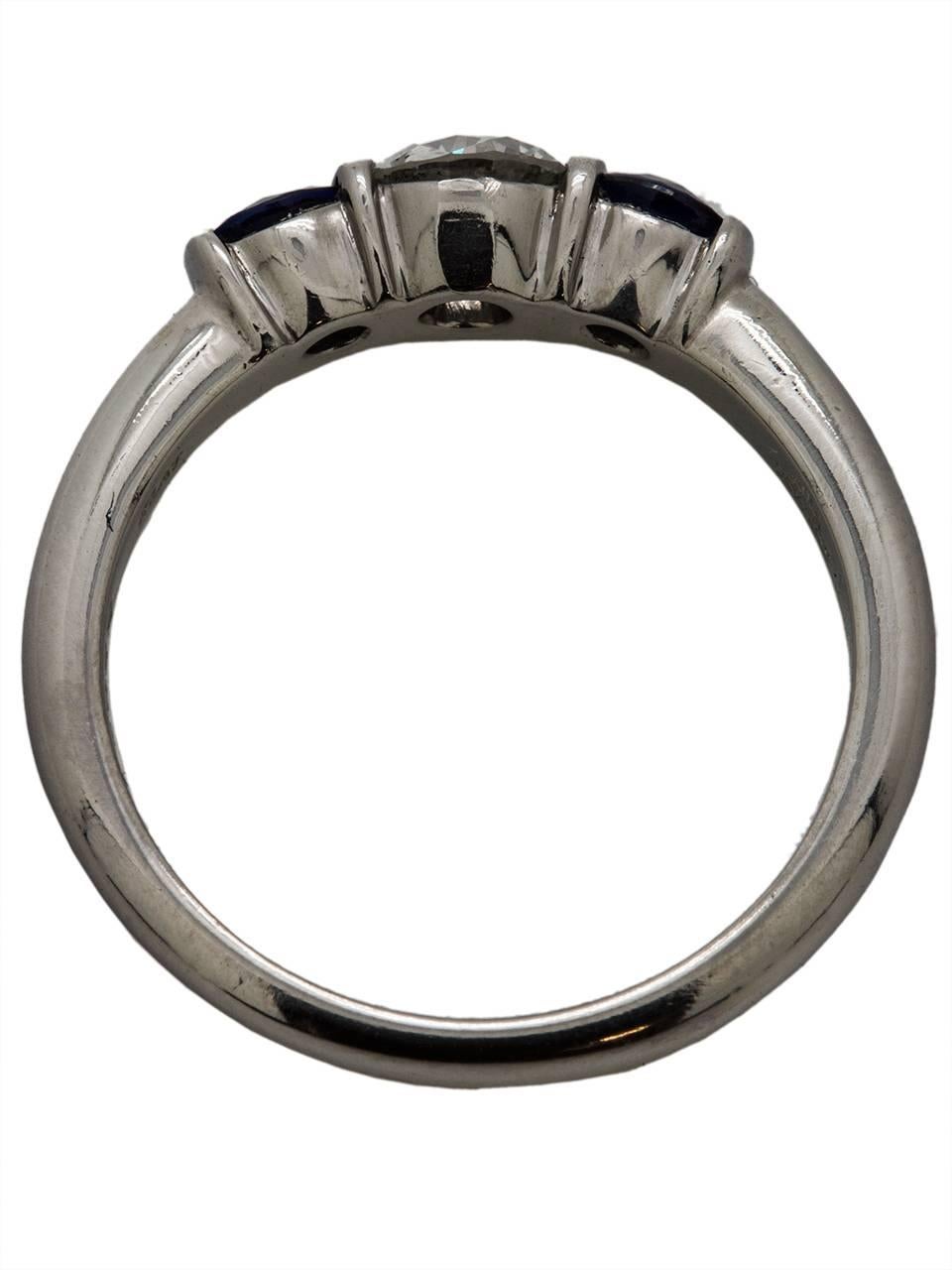 Modern Kwiat Sapphire Diamond Platinum Three-Stone Ring, circa 2000s