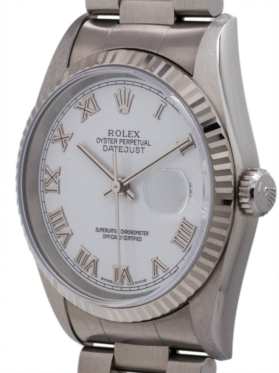 Rolex Datejust ref 16234 serial # T3 circa 1996. Full size man’s model 36mm diameter stainless steel with 18K white gold fluted bezel with sapphire crystal. Featuring white enamel dial  with applied silver heavy Roman indexes and silver baton hands.