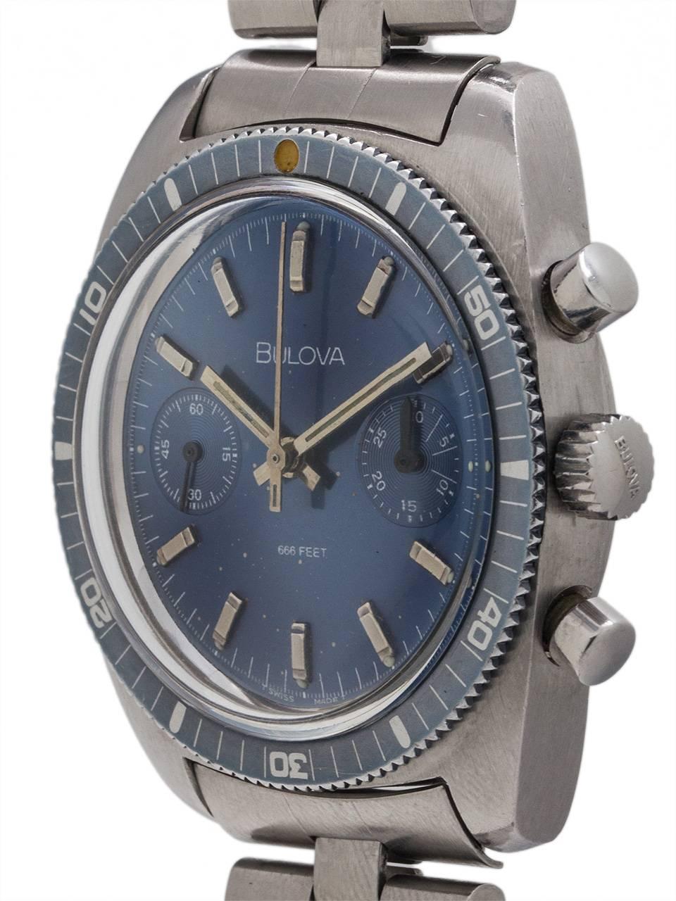 Oversize cushion shaped case Bulova manual wind diver’s chronograph circa 1960’s. Featuring 38 x 44mm case with wide elapsed time faded blue bezel, acrylic crystal, and blue original dial. With round chronograph pushers, signed Bulova crown, screw
