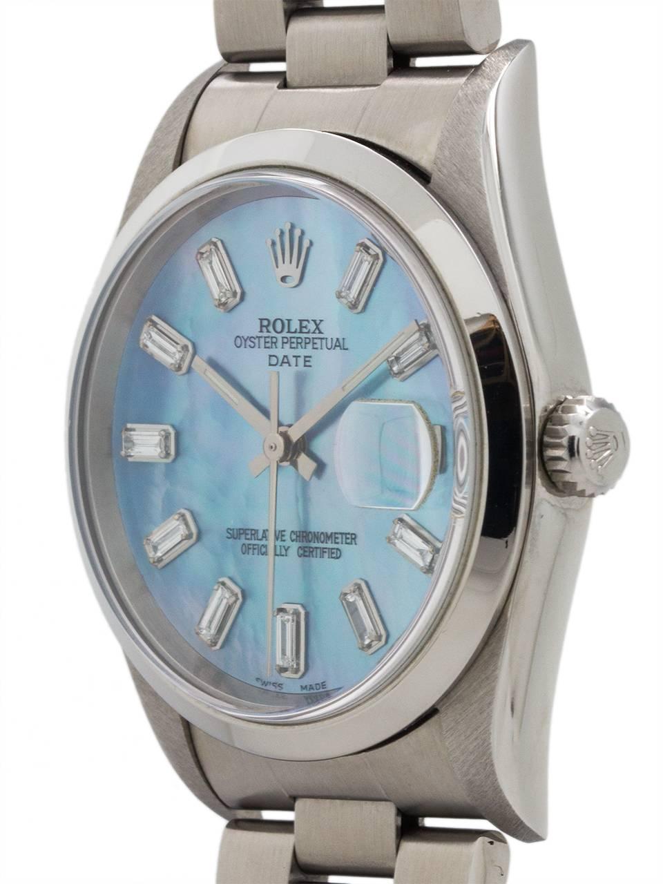 Rolex Oyster Perpetual Date ref 15200 serial# T4 circa 1996 with beautiful customized blue mother of pearl dial with all baguette diamond indexes. Featuring a 34mm diameter case with smooth bezel, sapphire crystal, and impressive looking all