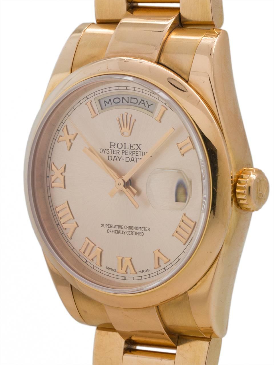 Rolex 18K PG Day Date President ref # 118235, serial# P8 circa 2000. 36mm full size man’s model with popular sporty style configuration consisting of smooth domed bezel and Oyster Presidential bracelet with hidden clasp.  Featuring original and very