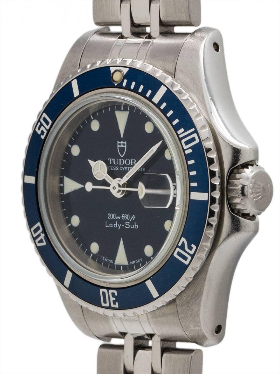 Excellent condition example Tudor Mini-Sub ref 96090 Serial: B419xxx circa 1990s. Women’s small size 27mm diameter stainless steel case with unidirectional blue elapsed time bezel and sapphire crystal. Original dark blue dial with tritium luminous