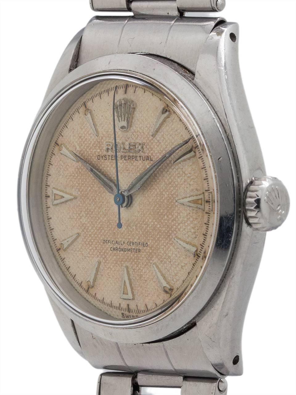 Vintage man’s Rolex Oyster Perpetual ref #6284 in stainless steel circa 1950’s. Featuring a 34mm diameter Oyster case in wonderful condition, with smooth dome bezel, acrylic crystal, and very pleasing original patina’d cream dial with raised  silver