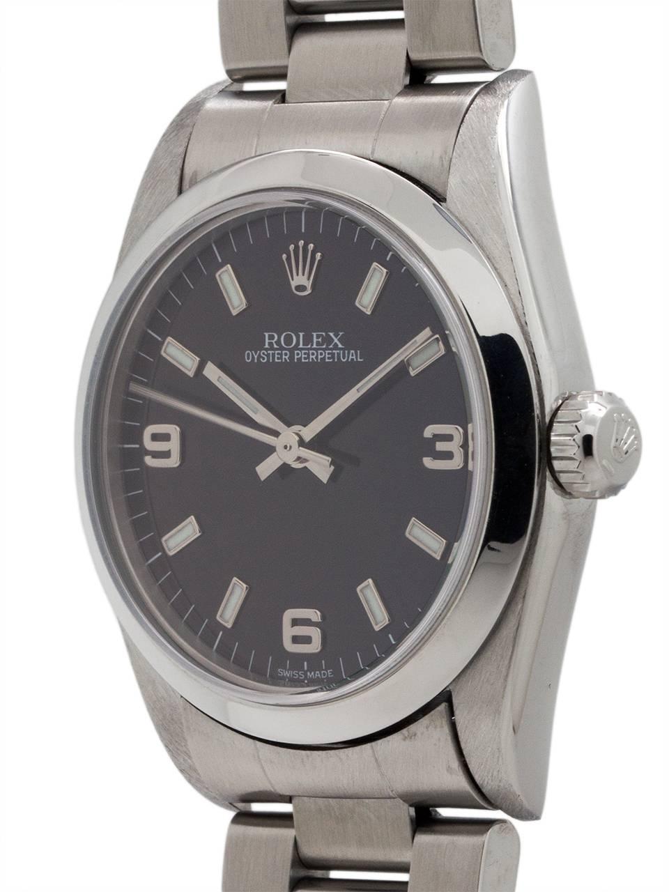 Rolex Oyster Perpetual midsize model ref 77080 stainless steel A2 serial # circa 1998. Featuring 31mm diameter case with smooth bezel and sapphire crystal and original black dial with popular 3/6/9 Explorer style configuration. Powered by self
