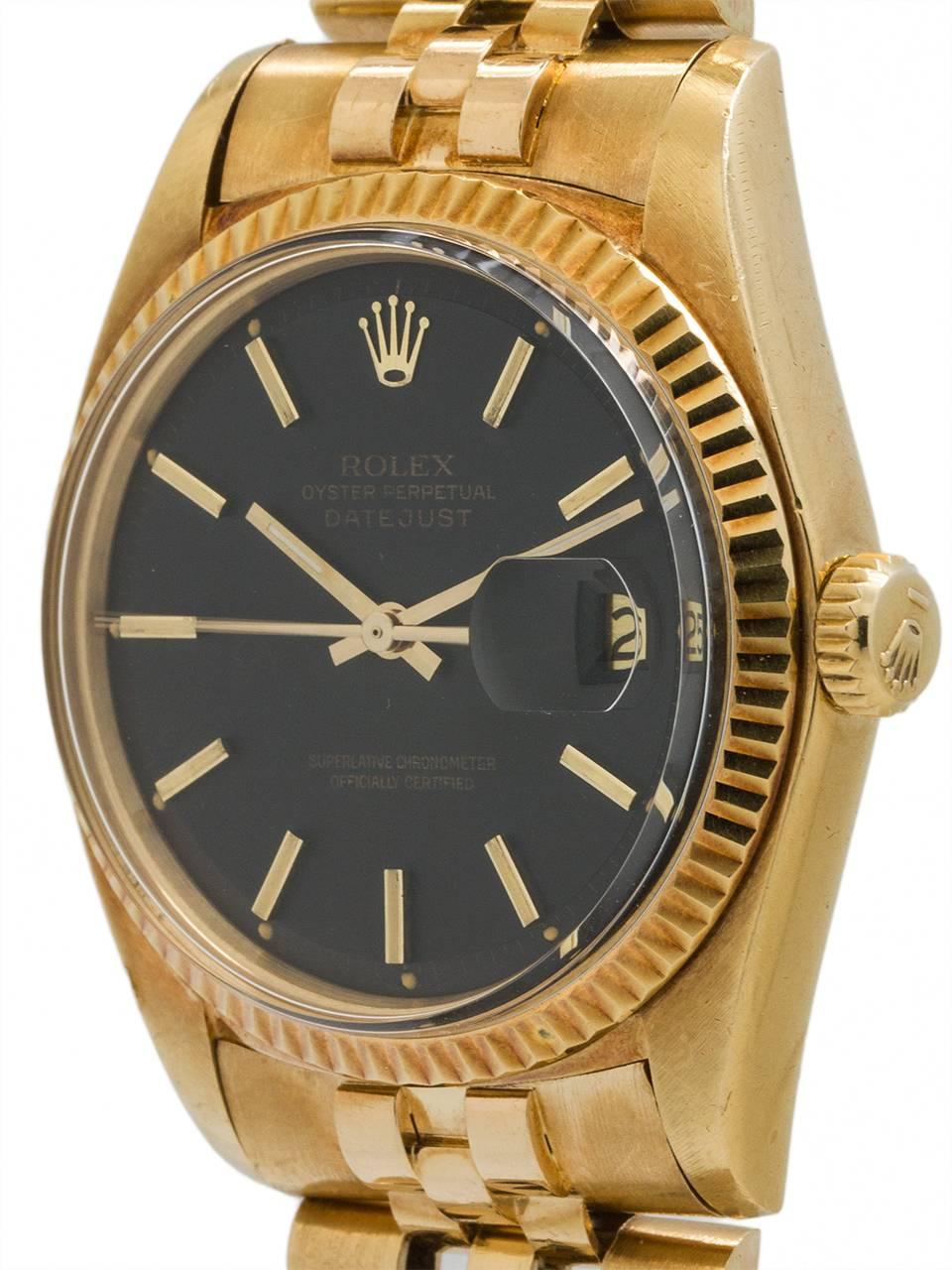 Rolex 18K yellow gold Datejust ref 1601 circa 1977. Great condition example, featuring a 36mm diameter case with acrylic crystal, fluted bezel and original matte black pie pan dial with gold applied indexes and gold baton hands. Powered by calibre