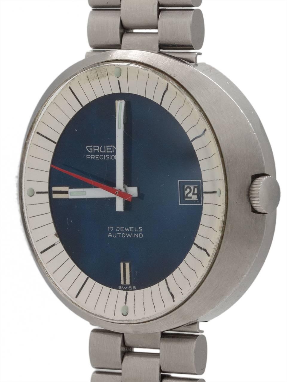 Super cool, and mint, thick saucer shaped Gruen automatic wristwatch circa 1970. Featuring 38x43mm disk shaped case (think Ikepod or Tissot) with recessed crown, wonderful bull’s eye dial with darkblue center, outer white track with black indexes