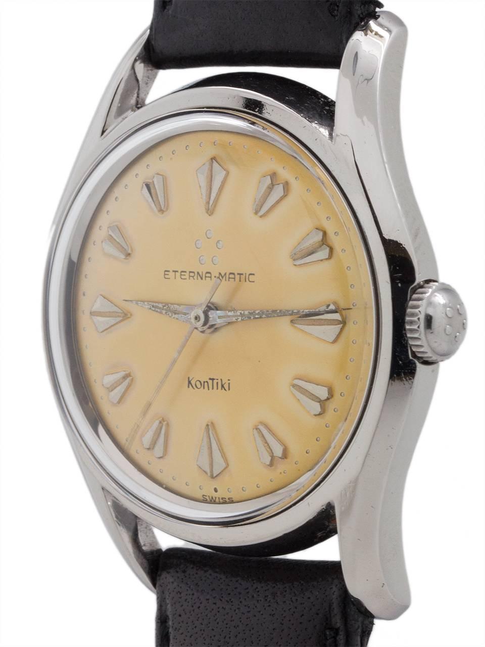 Eterna SS Eternamatic circa 1950’s. 34 X 42mm screw back case with extended curved lugs. Original 2 tone matte silvered dial with a beautiful golden patina and raised arrowhead indexes, tapered dauphine style hands and self winding movement with