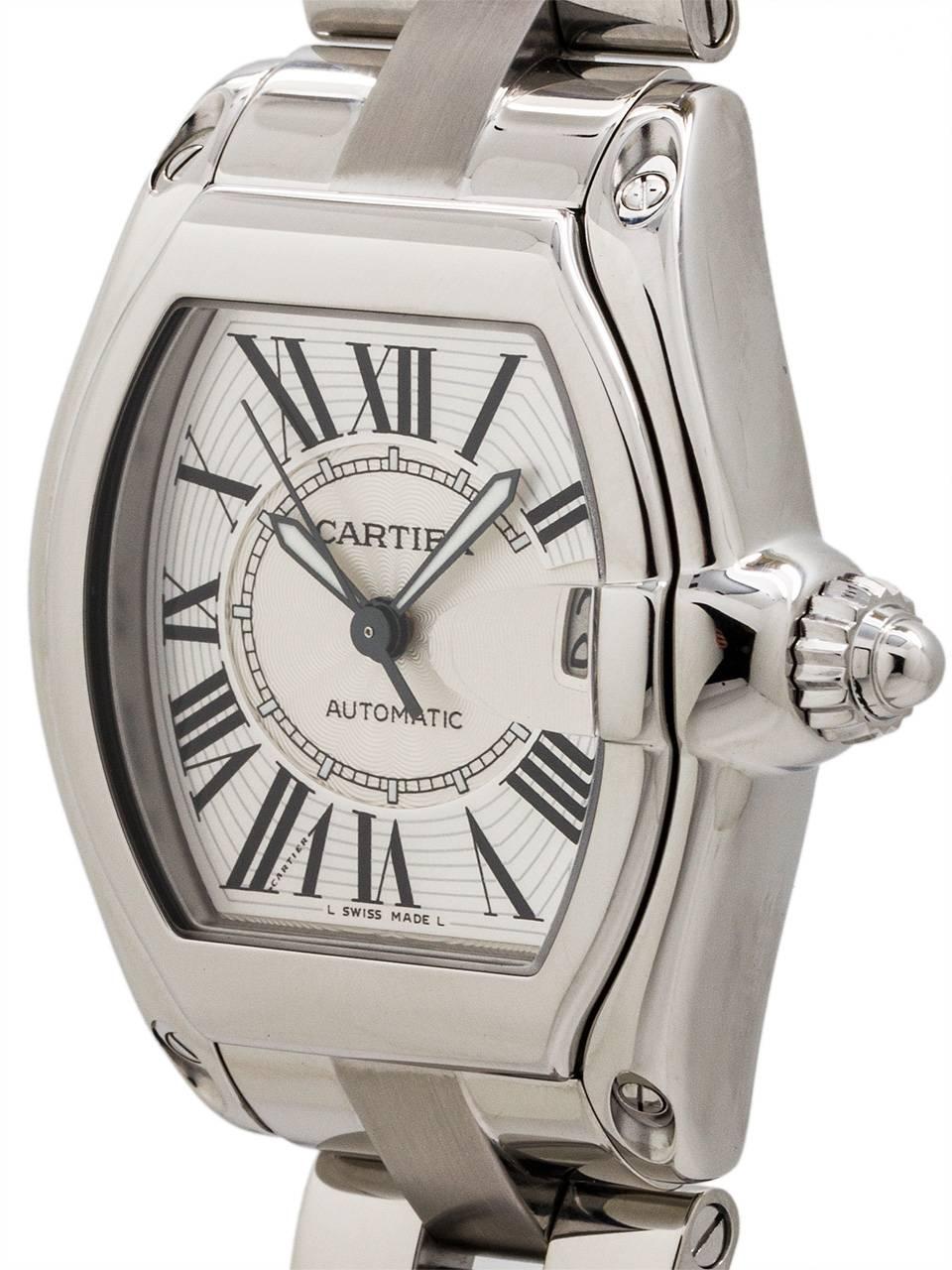 Cartier Man’s Roadster automatic ref# 2510 circa 2000s. 38 x 44.5mm tonneau shaped Stainless Steel case with steel cabochon style screw down crown, matte silver textured dial with black stretch Roman numerals, and black outline kite shaped luminova