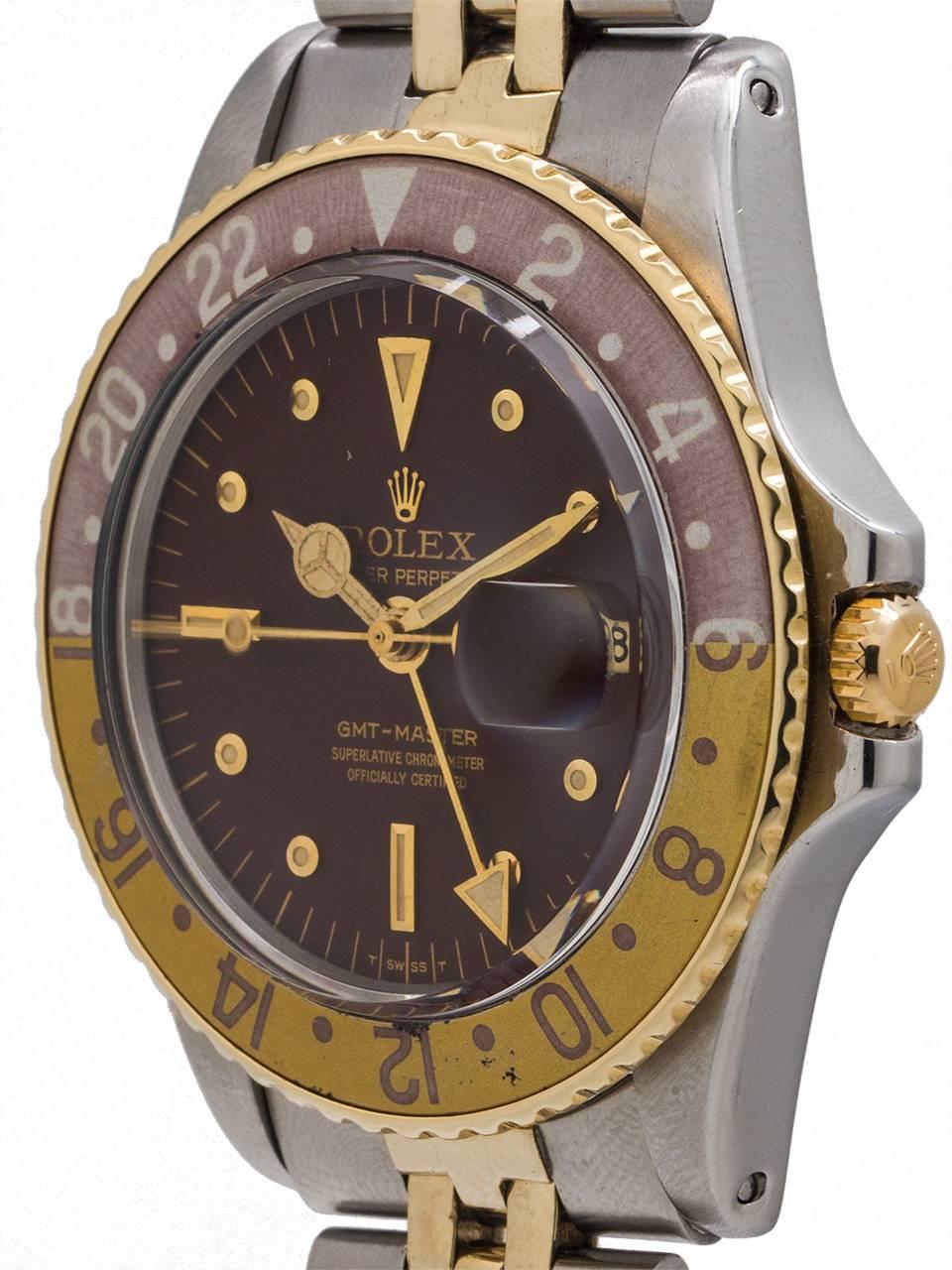 
Rolex SS/14K YG GMT ref# 1675 serial #2.7 million circa 1971. Featuring a 40mm diameter case with a nicely faded 24 hour gold and bronze bezel, acrylic crystal, and beautiful condition original chocolate “radial” dial with applied gold nipple