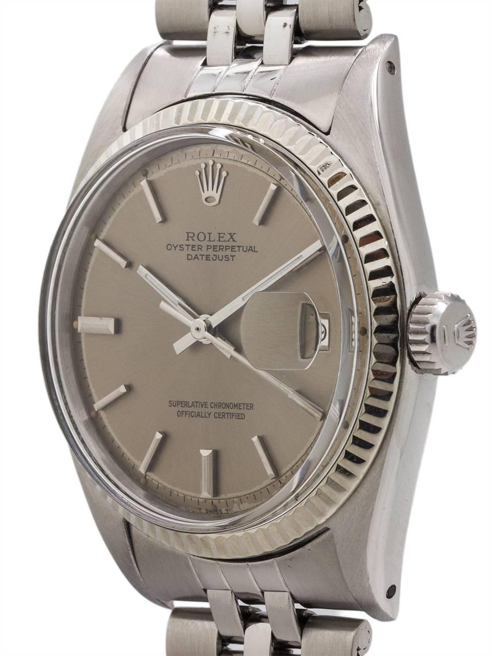 
Rolex Stainless Steel Datejust ref # 1601 serial# 1.7 million circa 1968. 36mm diameter case with 14K white gold fluted bezel and acrylic crystal. Original silver/grey satin pie pan dial with applied silver indexes and silver baton hands. Powered