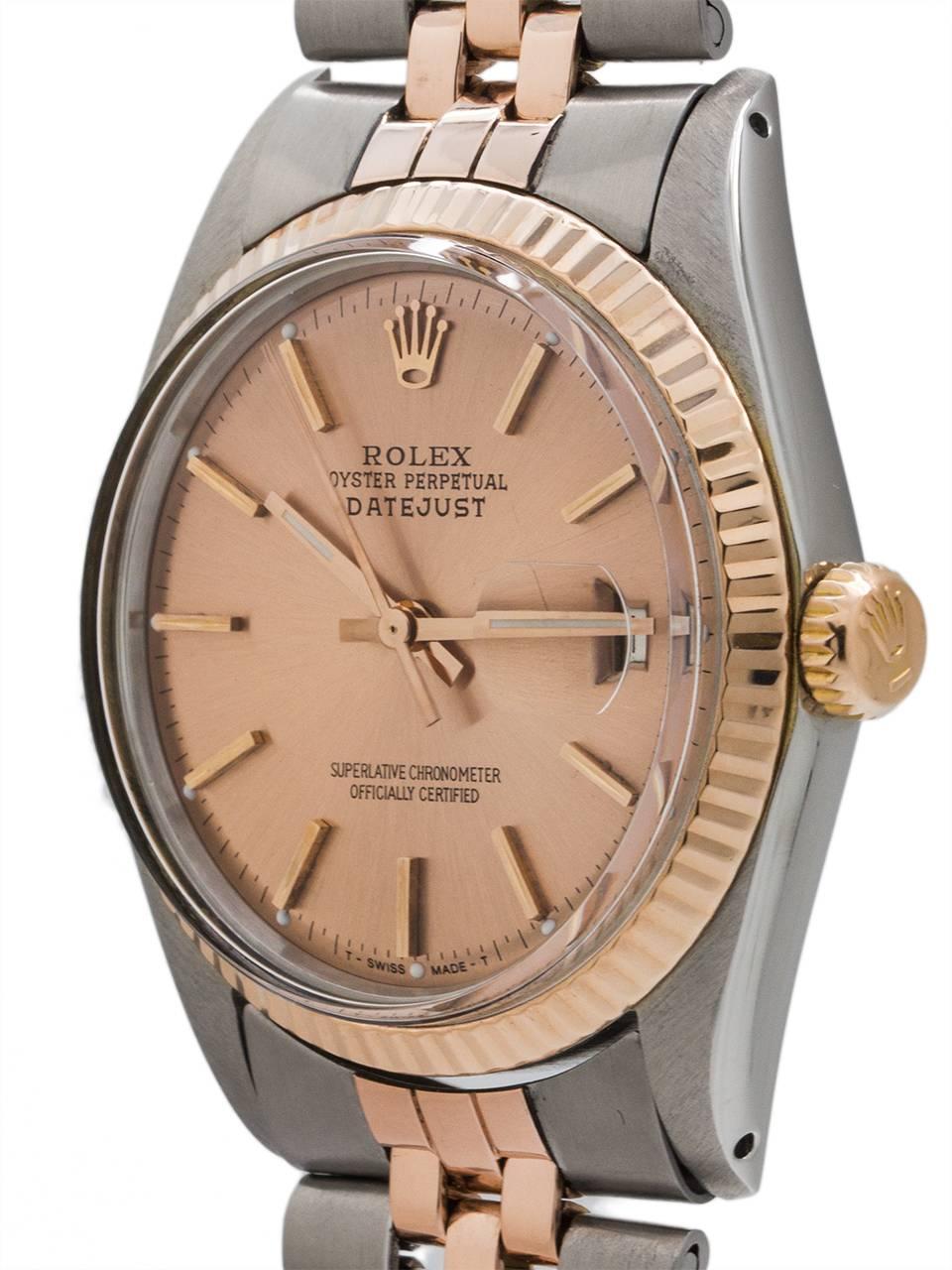 
Fabulous collector’s example Rolex Stainless Steel and 14K Pink Gold Datejust ref 1601 serial # 3.9 million circa 1974. Full sized man’s model 36mm diameter Oyster case with fluted 14K pink gold bezel and acrylic crystal. With original matte