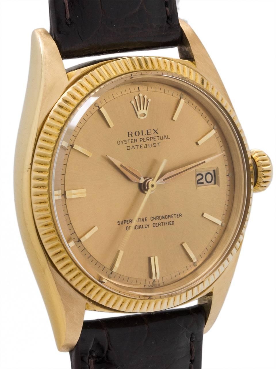 
An exceptional condition vintage Rolex 18K Yellow Gold Datejust ref 1601 circa 1961. Featuring a 36mm diameter Oyster case with finely milled fluted bezel, acrylic crystal and signed crown. With beautiful condition original champagne dial with