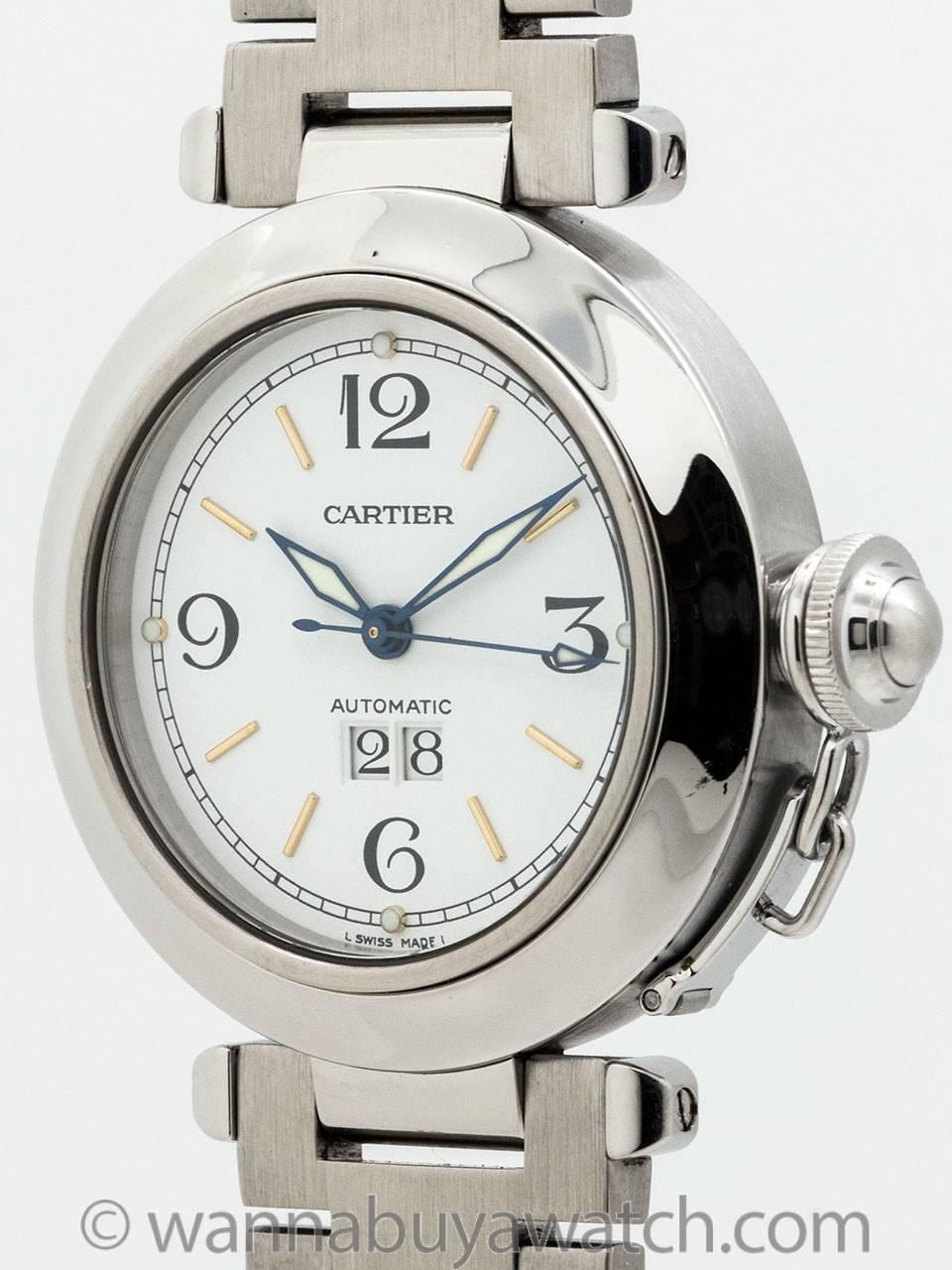 
Cartier Stainless Steel Pasha C ref 2475 circa 200s. 35.5 x 42 diameter case with smooth bezel, sapphire crystal and stainless steel screw down canteen style crown protector. Featuring original white dial with large black numerals and indexes,