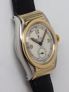 Rolex Yellow Gold Stainless Steel Ribbed Hooded Bubbleback Wristwatch, 1940s