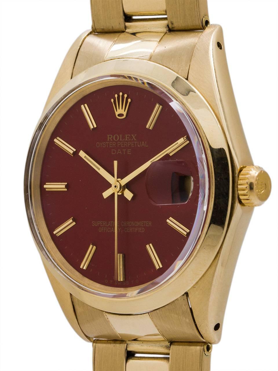 
Rolex 14K YG Man’s Oyster Perpetual Date ref 1503 serial#2.08 million circa 1969.  Featuring a 34mm diameter  case with 14K YG smooth bezel with acrylic crystal and beautiful “brick red” color dial with applied gold indexes and gilt hands. Powered