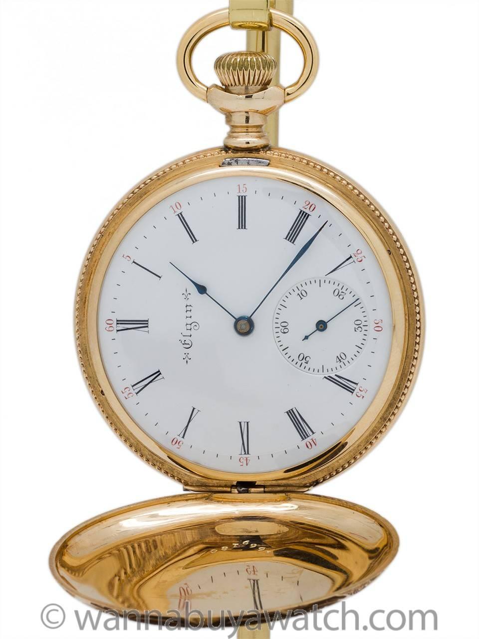 Elgin 14k yellow gold size 16-S (50mm) hunting case pocket watch, Circa 1902. Gorgeous condition beautifully engraved case design, no personalized engraving. Elgin 15-jewel high-grade three-bridge movement with beautifully damaskeened plates. White