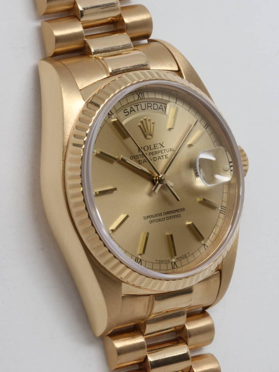 Rolex 18K Yellow Gold Day Date Wristwatch ref 18038 serial # 8.8 million circa 1986. 36mm diameter case with fluted bezel and sapphire crystal. Classic original champagne dial with applied gold indexes and hands. Powered by calibre 3155 self winding