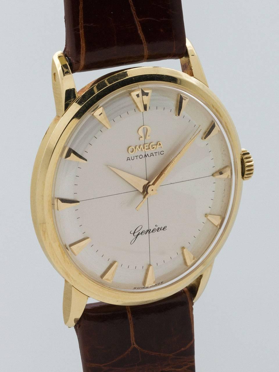 Omega 18K Yellow Gold Geneve case ref #1402 circa 1960. 34 x 40mm case with acrylic crystal and singed Omega crown. Gorgeous and original silver satin dial with cross hairs pattern, broad arrow markers, dauphine hands and applied Omega symbol.